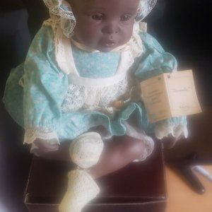 COLLECTIBLE AFRICAN-AMERICAN DOLL
